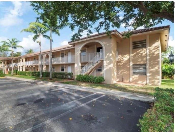 Investor opportunity!! beautiful 2 bedroom 2 bathroom Corner unit, updated kept in good condition, ceramic tile throughout, updated bathrooms and kitchen with stainless steel appliances, new washer and dryer, newer A/C, a community pool and multiple parking spaces, shopping center near and access to FL turnpike, excellent schools.