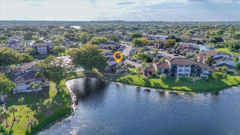 Photo of 9860 Nob Hill Ln #9860, Sunrise, FL 33351 (MLS # A12016836)