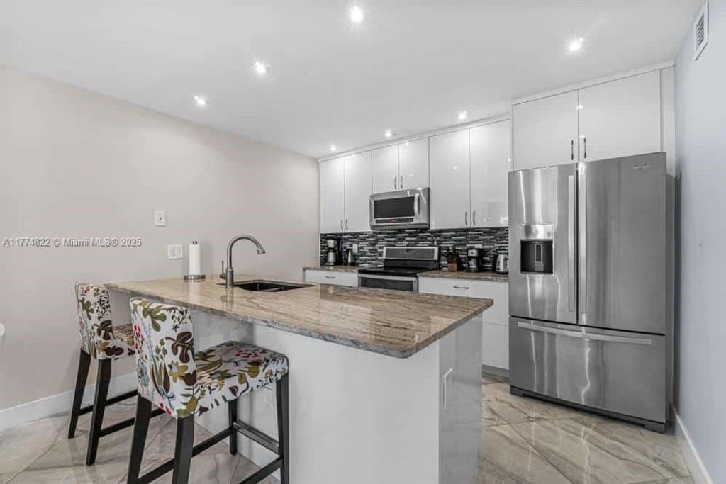 Photo of 136 Waterside Dr #136, Hypoluxo, FL 33462 (MLS # A11774822)