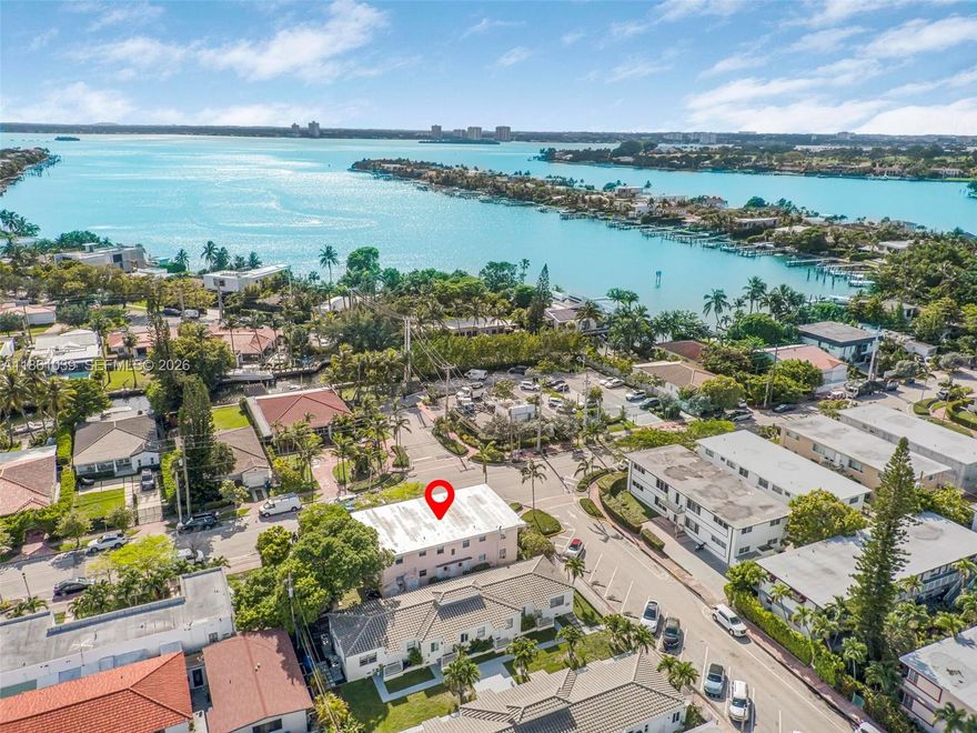 The property consists of 4 units of two bedrooms and one bathroom each al rented at $2,300. There is a garage on the side being used as a storage that could be rented in the future is desire for $1,500 on top of the $110,400 annual income. This property already passed the 40 year in 2019. Elastomeric roof redone in 2025. Biscayne Point fourplex corner lot of 6,215 SQFT. One unit has central A/C, the other three wall units. The buyer could install impact windows update bathrooms and kitchen to increase the rents to $2,600 each