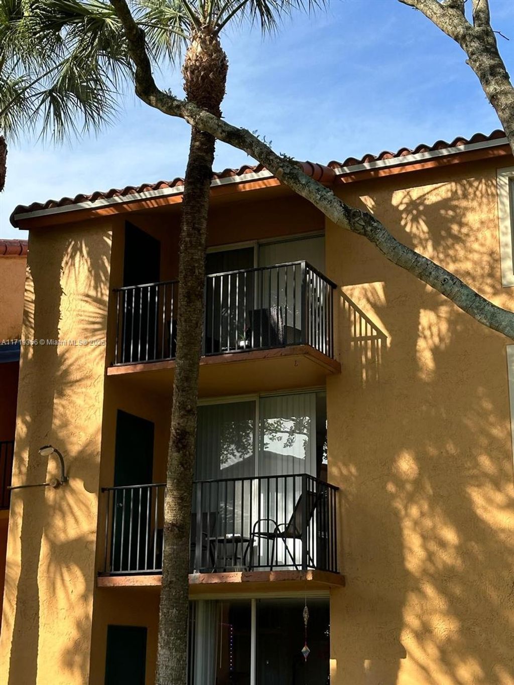 Photo of 10765 Cleary Blvd #308, Plantation, FL 33324 (MLS # A11719356)