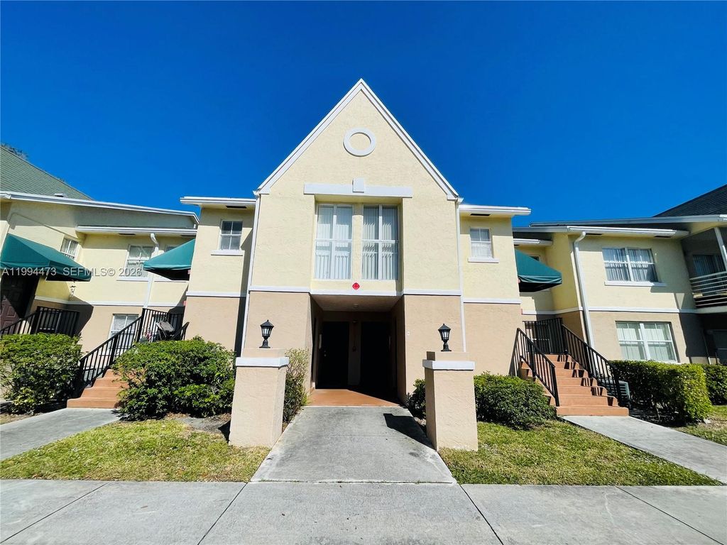 Photo of 2829 N Course Dr #104, Pompano Beach, FL 33069 (MLS # A11994473)