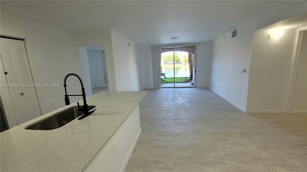 Photo of 2021 Renaissance Blvd #104, Miramar, FL 33025 (MLS # A12031473)