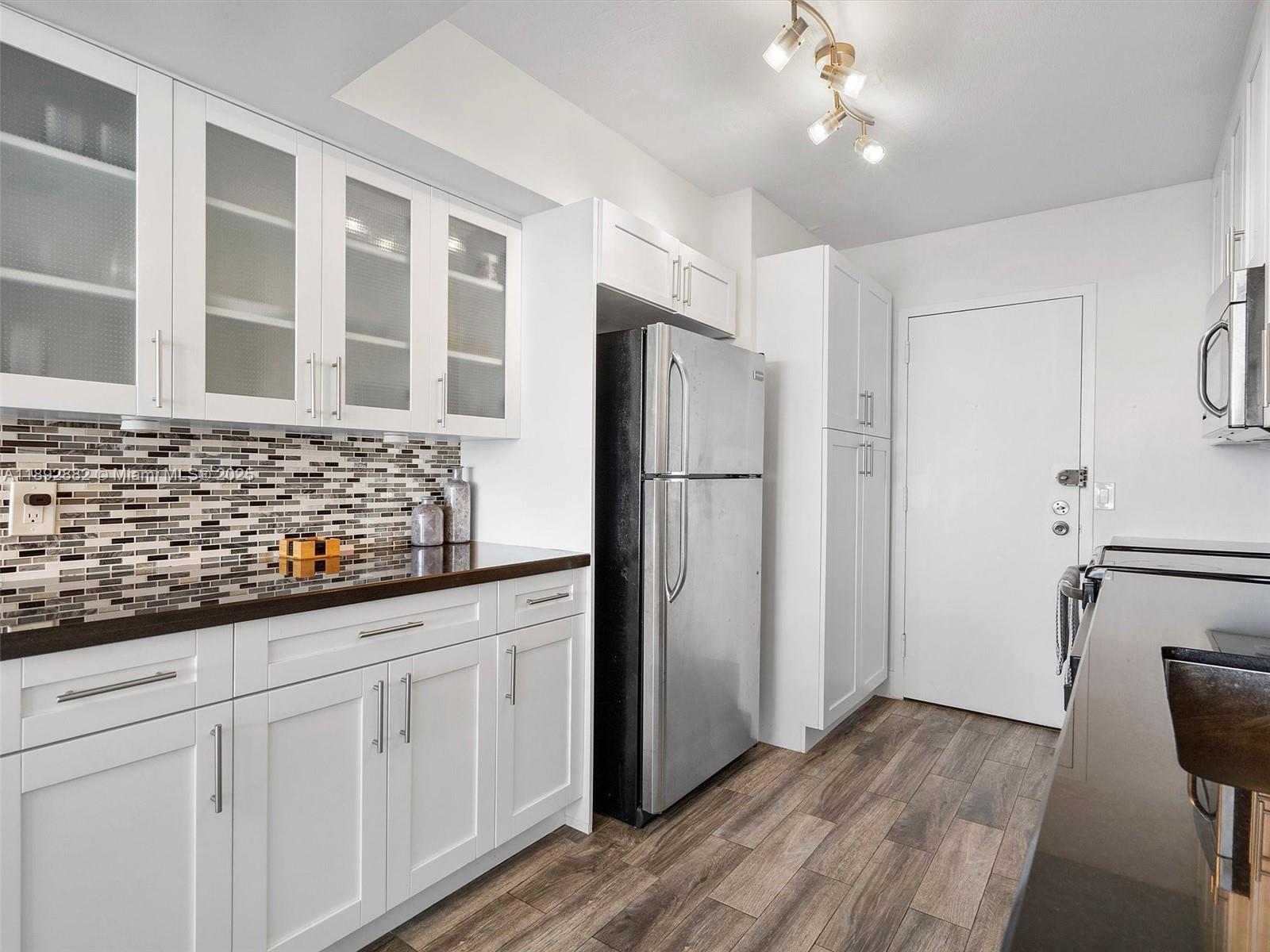 QUADOMAIN TOWER I AND IV - Residential Lease