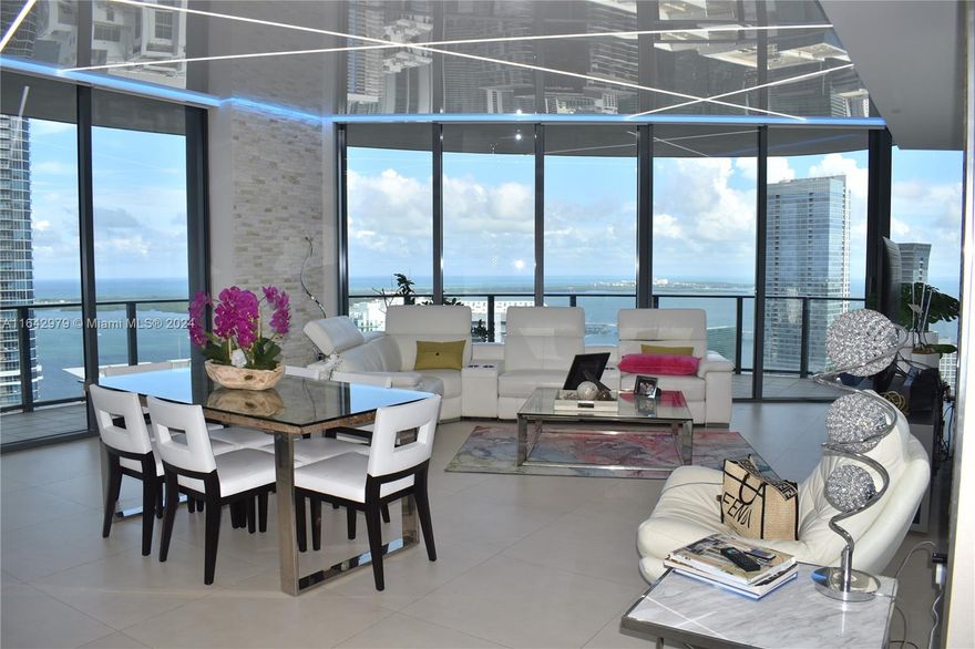 This highly desireable "01"line SE corner Penthouse redefines luxury living in the heart of Miami's vibrant Brickell neighborhood. Flatiron is Ugo Colombo's latest masterpiece! Be prepared to be captivated by the Panoramic ocean views that stretch endlessly before you, a mesmerizing tableau that serves as your daily backdrop! Upgrades include marble accent walls, custom mirrors, Savant smart home, surround sound system, all automatic blinds,  stretch ceilings with surround LED lighting that reflects the stunning views! Floor-to-ceiling windows blur the line between indoor luxury and outdoor splendor. This residence offers a lifestyle that is nothing short of extraordinary from high-end boutiques to Michelin-starred restaurants, to trendy nightspots. Your home in the sky! Owner/Agent