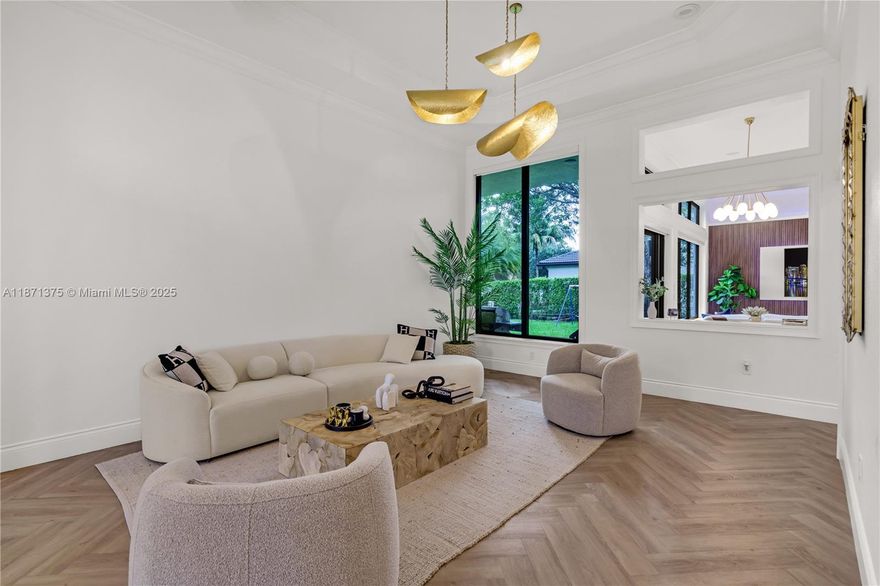 Your Next Corner Home Awaits in Sunset Lakes! Spacious one-level living in 2,844 sqft, 5-beds, 3-baths gem in a sought-after gated community for rent, unfurnished, at an exceptional rate. Bright & Elegant Interiors: Gorgeous hardwood herringbone flooring & soaring ceilings elevate the ambiance. Chef’s Kitchen: beautifully renovated center of the home, with a generously sized peninsula, marble countertops, smart stainless-steel appliances, and custom range hood. New plumbing, electricity, impact windows, spacious laundry room. Primary Suite Retreat: Shower & tub, walk-in closets. 3-car garage + 4 more. Big patio for entertaiment & potential pool. Gated security with scenic lake view, clubhouse w/pool, tennis/basketball courts, gym, children’s park, picnic area, & security patrol; Welcome!