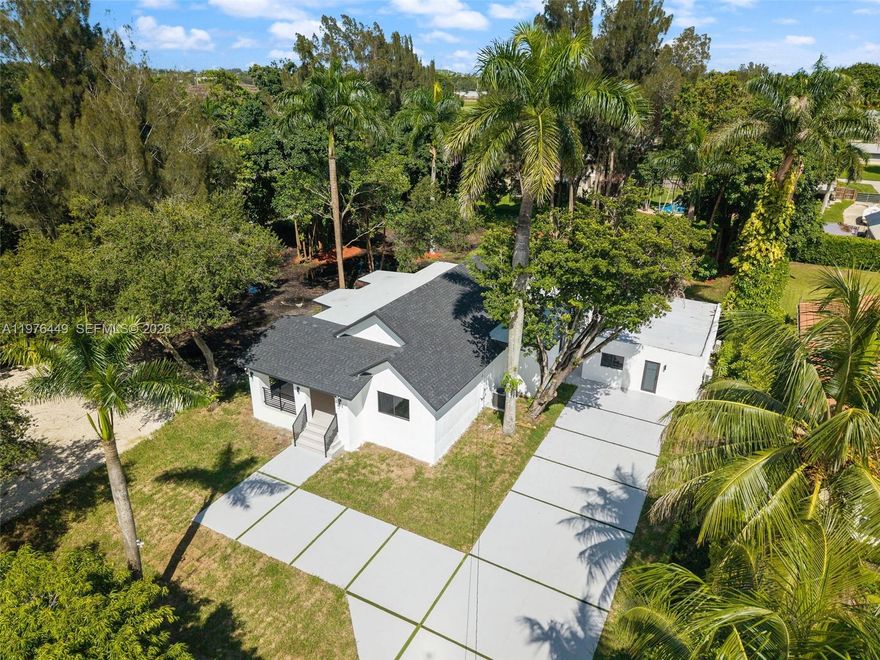 Charming Davie Ranch estate, perfectly situated on a sprawling 39,614 SqFt double lot. Thoughtfully redesigned, the main home offers 4 bedrooms and 3.5 bathrooms, featuring a custom chef’s kitchen, an oversized master suite, and a spacious laundry room. A new roof adds peace of mind, while the detached 1-bedroom, 1-bath guest house with full kitchen provides the ideal space for family, guests, or private living. Surrounded by Davie’s vibrant community, top schools, and convenient access to major highways, this property blends modern comfort, flexible living, and an unbeatable central location.
