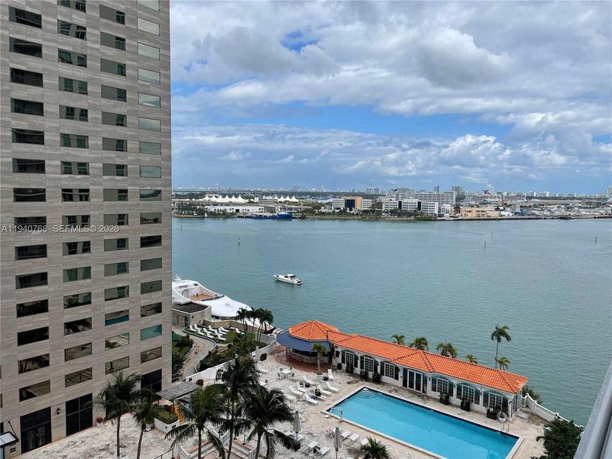 Direct views of Biscayne Park, Pool, and Bay. Italian kitchen cabinets and marble counter top bath. Building amenities includes: 2 swimming pools, Jacuzzi, sundeck, 2 fitness centers, 2 party rooms, conference room , and 24 hrs security, valet, and concierge. Centrally located within minutes to SoBe, Grove, Gables, and Airport.