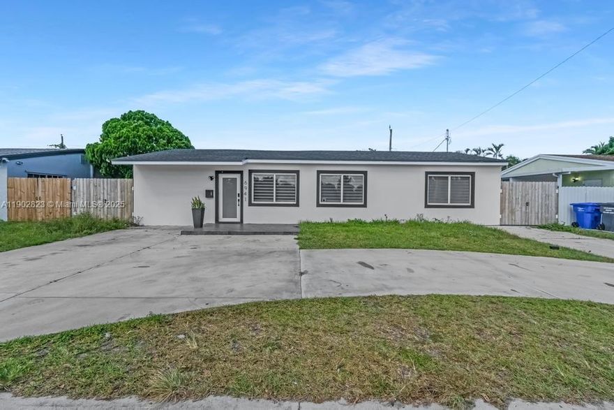 Fall in love with this completely remodeled 4-bedroom, 3-bath home in desirable Hollywood! Every detail has been thoughtfully updated — including new electrical, plumbing, roof, and impact windows and doors for lasting peace of mind. Step inside to discover bright, open living spaces with modern finishes and a seamless flow that’s perfect for everyday living and entertaining. The spacious patio and terrace make outdoor gatherings effortless, while the versatile layout includes a bedroom with private access — ideal for an in-law suite, guest quarters, or home office. Truly move-in ready and designed for modern comfort and convenience!