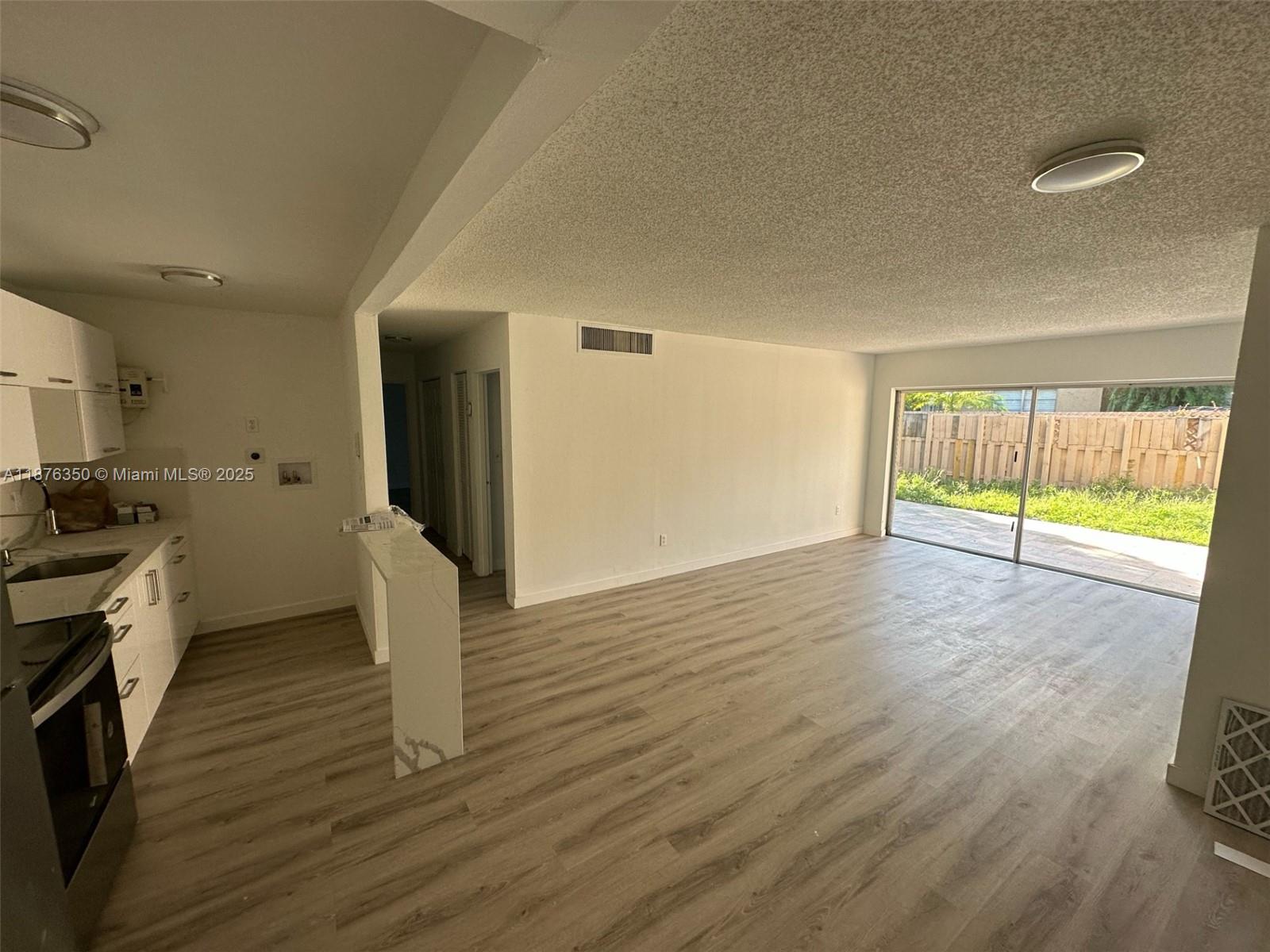 Welcome to our modern luxurious two bedroom two bathroom condominium with a backyard in the heart of Doral!!
This property is located on the first floor in office 24 hour security 2 remodeled, pools, and a variety of amenities.
Enjoy convenience of an upgraded kitchen with stainless steel appliances, granite countertops, and plenty of
cabinet space, high ceilings, large windows, and ample natural like create a warm, inviting atmosphere. The
homeowners association will require a 650 credit score and background checks for whoever is living in the property
over the age of 18 which comes at a cost of $150 per person only four people total are able to live in the residence
and no pets. You have two parking spaces and visitor spots are also available