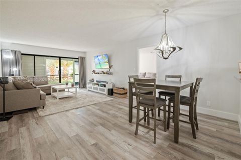 Photo of 301 Racquet Club Rd #104, Weston, FL 33326 (MLS # A11941937)