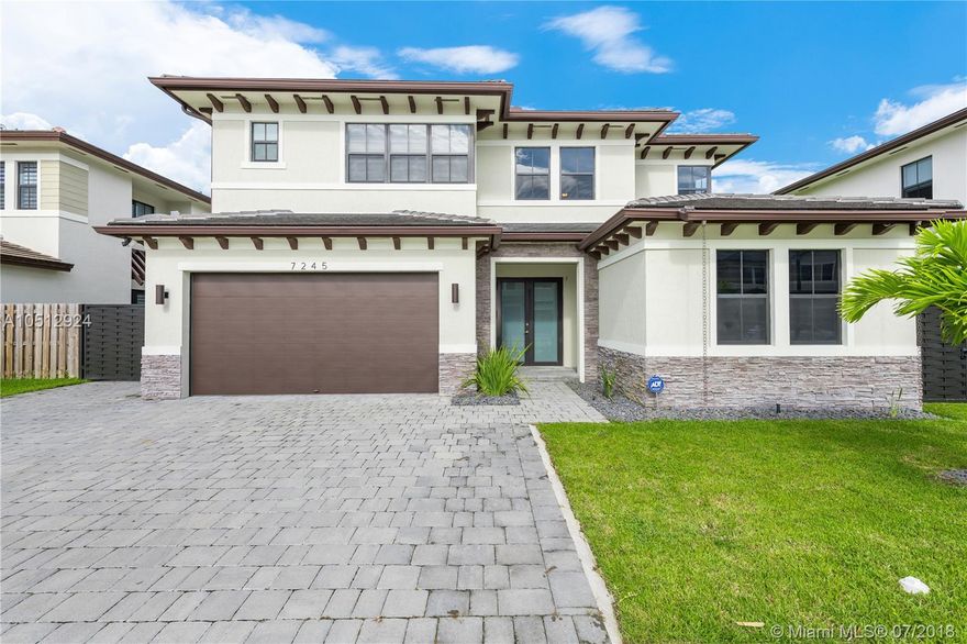 Built in 2015, and defined by attention to detail, this spectacular home features the finest contemporary finishes. Every detail was carefully selected to combine function with elegance. All bedrooms have en-suite bathrooms. There is one bedroom and full bathroom on the first floor, perfect for accommodating guest. Other home features include, custom built-in closets/cabinetry, custom built-in office furniture & Murphy bed, impact windows and doors throughout, Quartz countertops kitchen/baths, custom stair case with iron railing, 24 x 24 diagonal porcelain flooring throughout the open concept first floor, wood flooring throughout the second floor,  irrigation system, and a beautiful crystal clear saltwater pool for your enjoyment throughout the year.