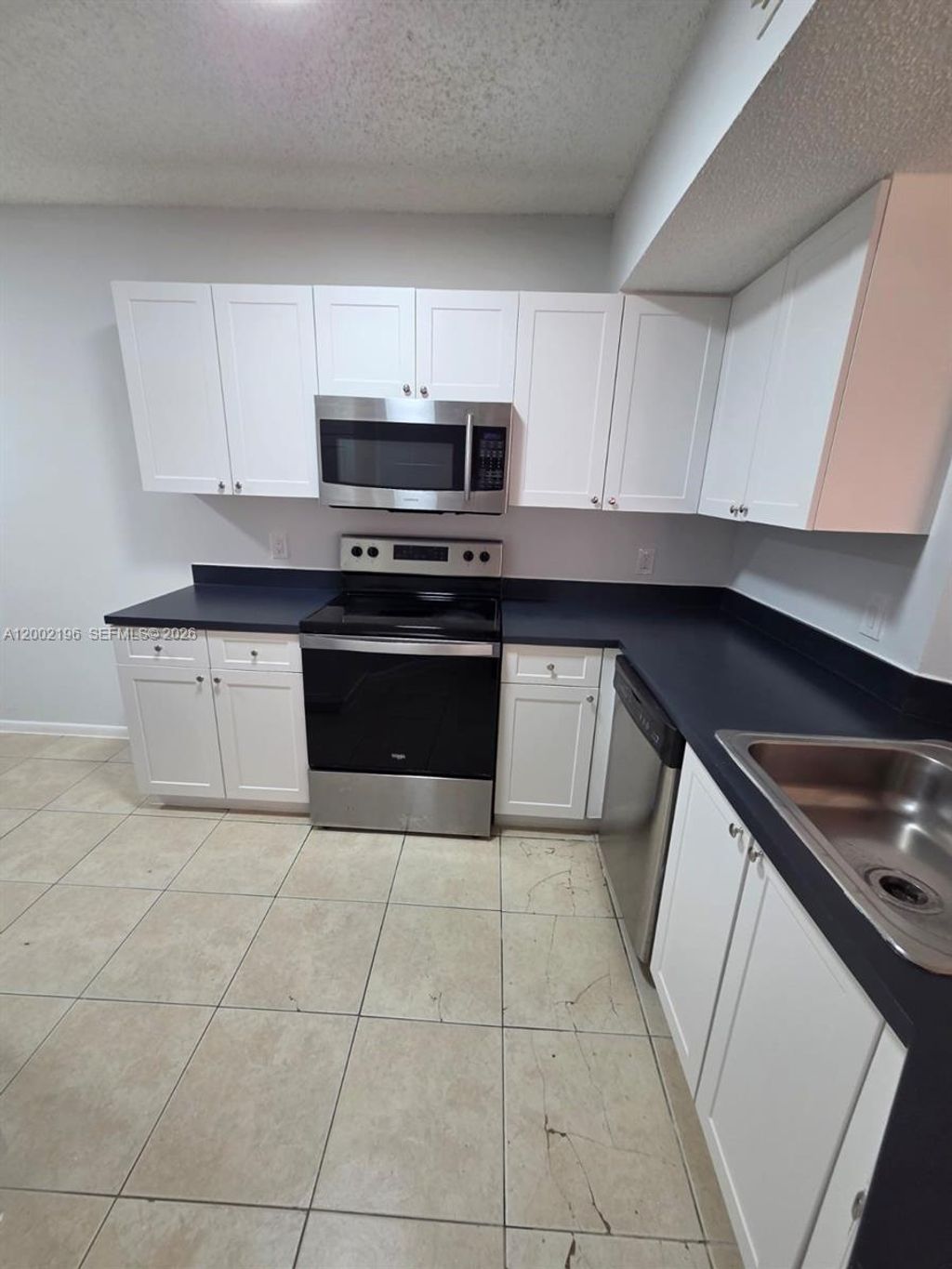 Photo of 8871 Wiles Rd #208, Coral Springs, FL 33067 (MLS # A12002196)