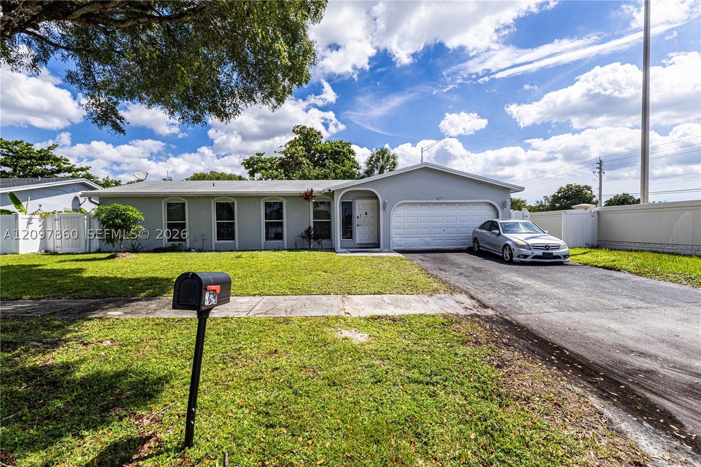 Photo of 5600 NW 57th Way, Tamarac, FL 33319 (MLS # A12097860)