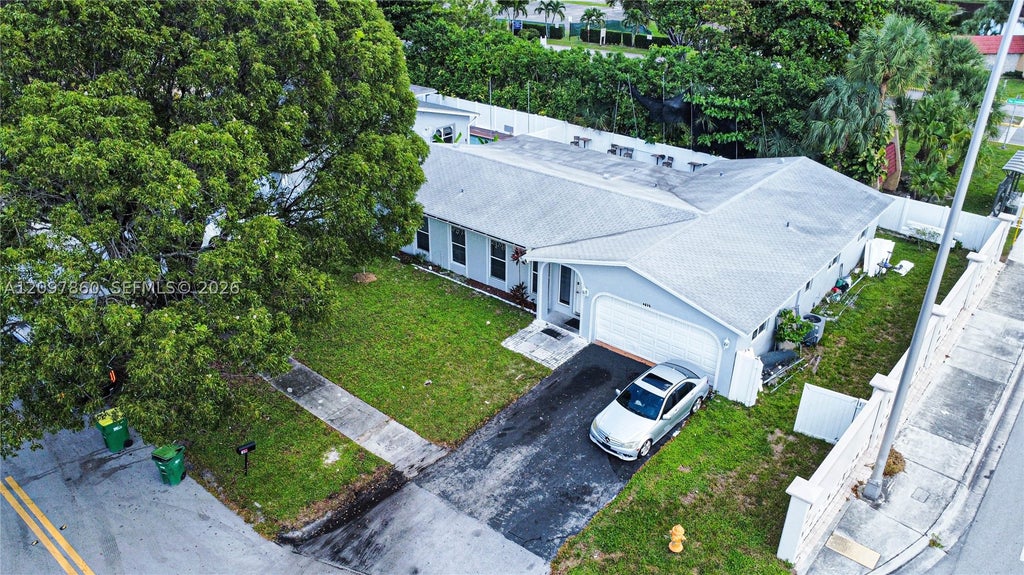 Photo of 5600 NW 57th Way, Tamarac, FL 33319 (MLS # A12097860)