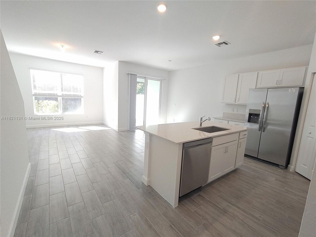 Photo of 4363 Hammock Grove Dr, Lake Worth, FL 33467 (MLS # A11821131)