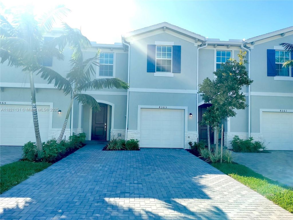 Photo of 4363 Hammock Grove Dr, Lake Worth, FL 33467 (MLS # A11821131)