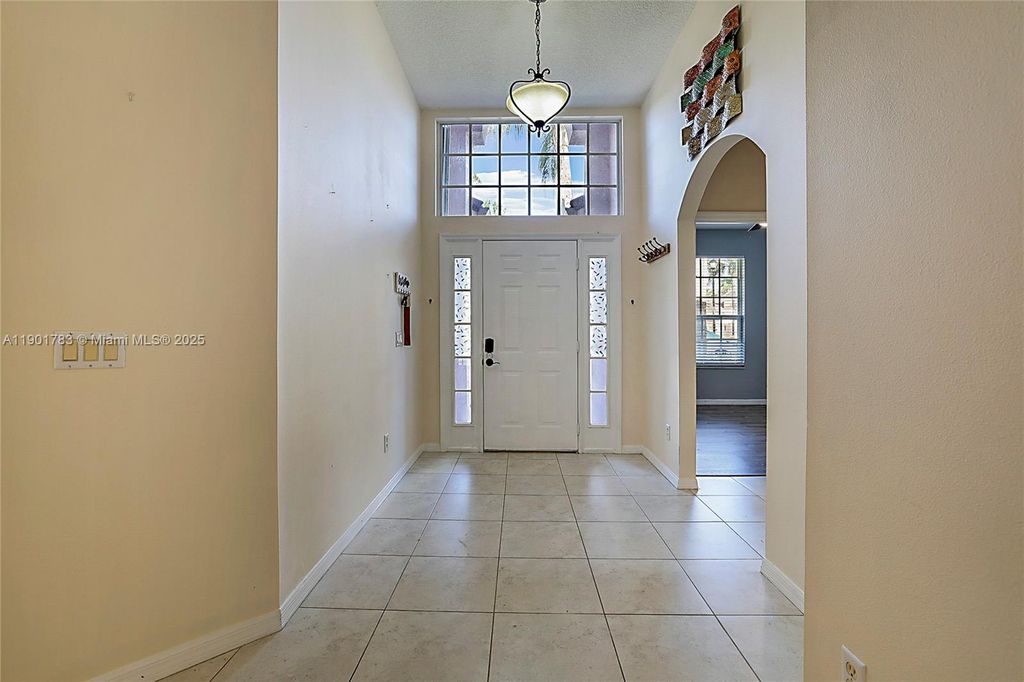 Photo of 568 SW Saint Martins Cv, Port St Lucie, FL 34986 (MLS # A11901783)