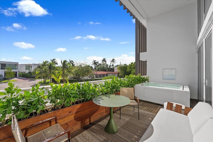 Exceptional 3 bed/3.5 bath at The Ritz-Carlton Residences, Miami Beach offers 3,292 SF + 333 SF terrace, crafted w/ high-end materials & sophisticated design. Great room features 17+' ceilings & Venetian plaster. Kitchen includes European cabinets, Gaggenau suite, dual dishwashers, Liebherr wine cooler, green onyx bar & Dekton countertops. Glass staircase integrates open layout w/ designer lighting & custom millwork. Primary includes dual wardrobes, separate water closets + en-suite w/ infrared sauna, Toto washlets & jetted tub. Each bedroom has en-suite bath, Orlean wallpaper, custom closets + electric blackout shades. Other features include app-controlled terrace irrigation, fireplace + storage unit. Nestled in Miami Beach's most exclusive buildings, this loft exemplifies modern luxury.