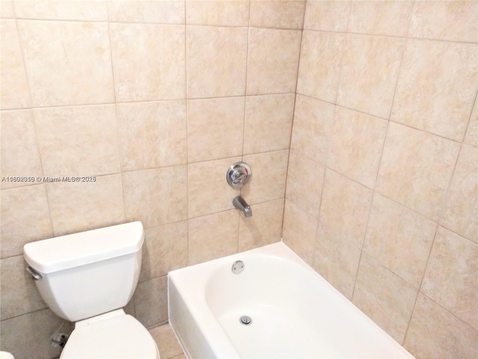 WOODSIDE IN KENDALL CONDO - Residential
