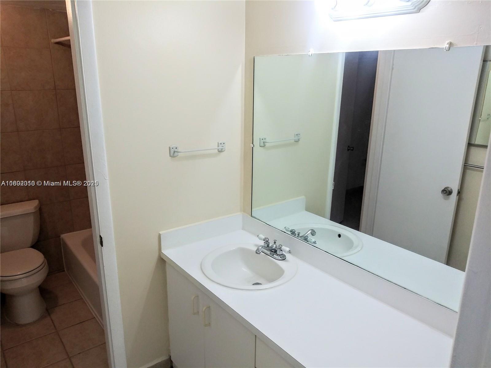 WOODSIDE IN KENDALL CONDO - Residential
