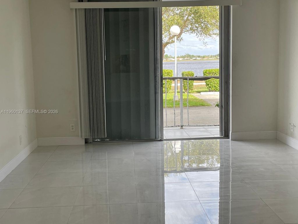 Photo of 470 Executive Center Dr #1C, West Palm Beach, FL 33401 (MLS # A11960137)