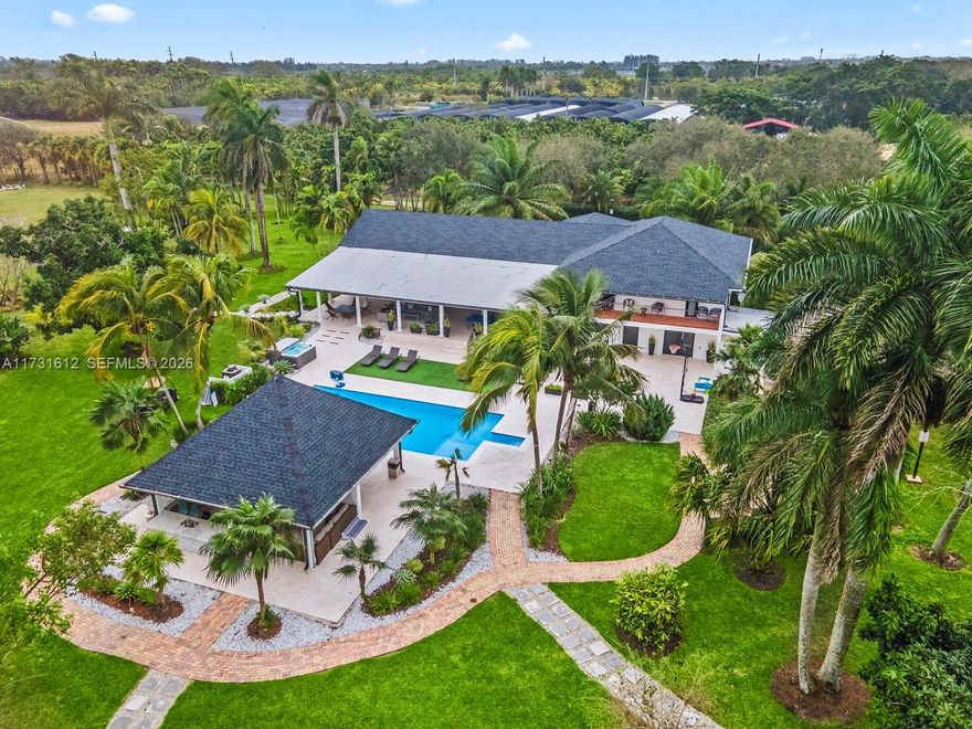 This spectacular house of almost 5 acres offers an experience close to nature, a unique country life, surrounded by different trees. Don't miss the experience of living in a perfect place for you and your family where you can enjoy nature, large spaces completely renovated and equipped for indoor and outdoor entertainment including tennis and soccer courts It also can be used or rented for different types of party events. It has 3 rooms on the second floor and 2 rooms on the ground floor and 6 Baths in the Redland property located minutes from West Kendall.