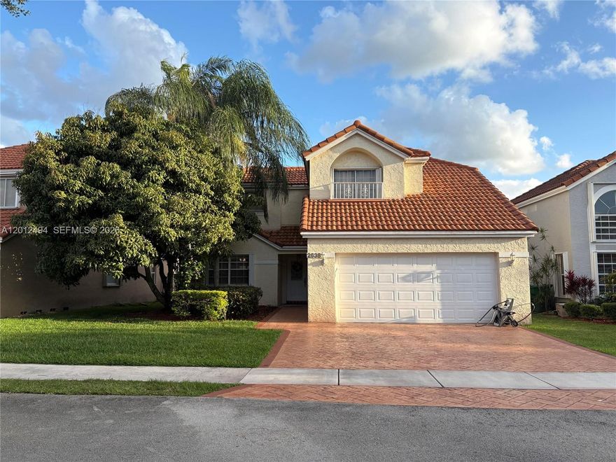 Welcome to this beautiful home located at 2638 Oak Park Cir in the desirable neighborhood of Forest Ridge in Davie, Florida. This well-maintained property features a 2-car garage and 3 spacious bedrooms upstairs. The open-concept living space downstairs boasts a bright and airy atmosphere, enhanced by high ceilings and large windows. The kitchen is equipped with stainless steel appliances and ample counter space. Outside is a backyard oasis with a pool and patio appropriate for relaxation and entertaining. The home also has replaced its PVC piping-as well as a new air conditioning system, bought in 2023.