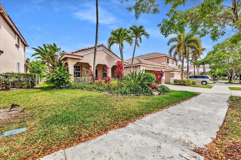 Photo of 1634 Sandpiper Cir, Weston, FL 33327 (MLS # A12012446)