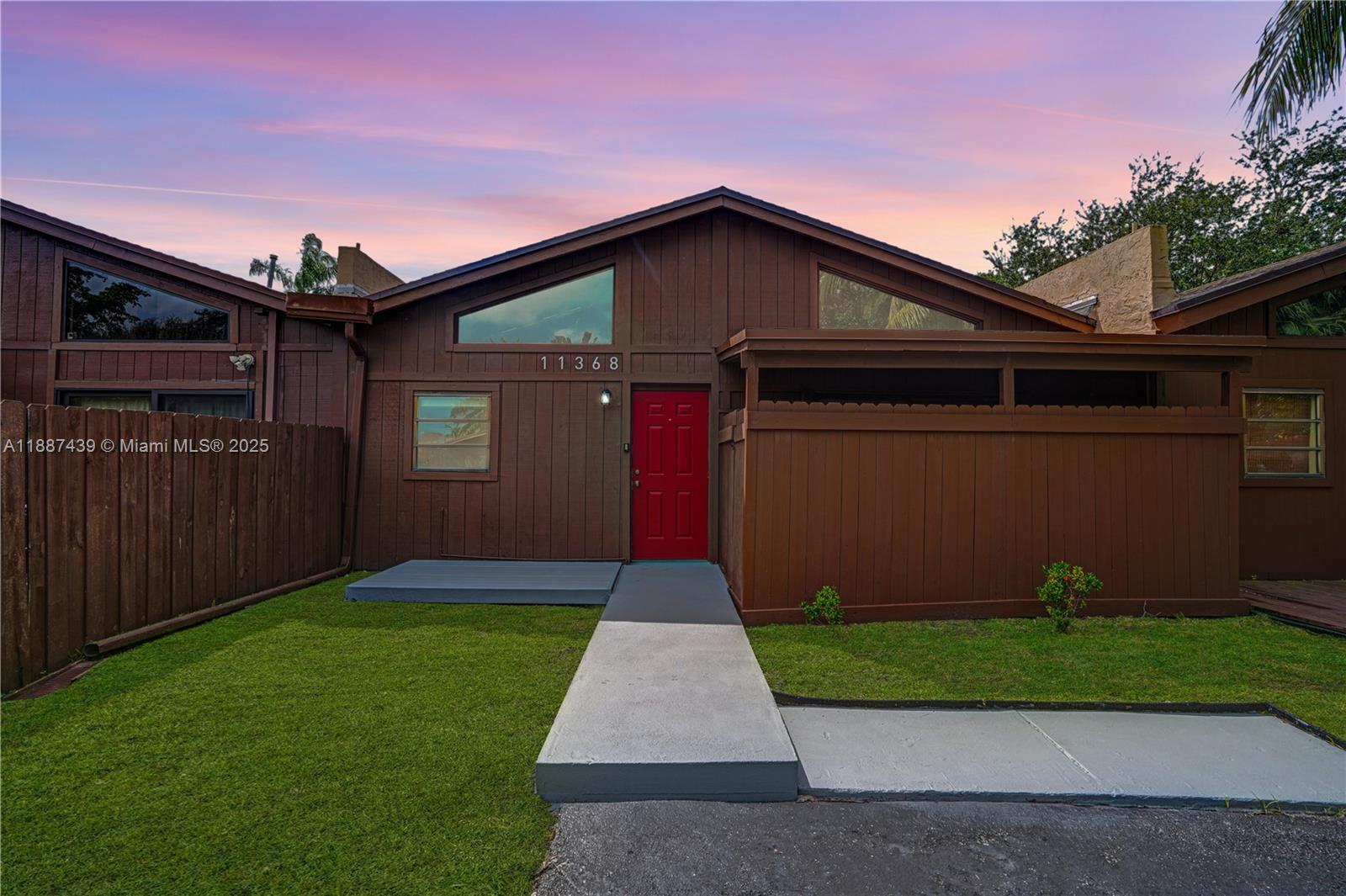 Inviting 2BR/2BA Villa in desirable Pinetree Village/Killian Pines offers 1,080 SF of bright living space with soaring 14-ft vaulted wood-beam ceilings that create a warm ambiance. The open layout connects seamlessly to a private fenced yard & patio, perfect for outdoor living and entertaining. The spacious primary suite features vaulted ceilings, an en-suite bath & walk-in closet. Gas appliances (range, dryer, and water heater) add efficiency, while the 2020 roof and water heater provide peace of mind. Enjoy two parking spaces plus guest parking. Pinetree Village offers a tranquil atmosphere, mature tree-lined streets, just 151 homes, and low HOA fees with no association approval required! Ideally located near US-1, Dadeland Mall, The Falls, Baptist Hospital, top schools, dining & parks