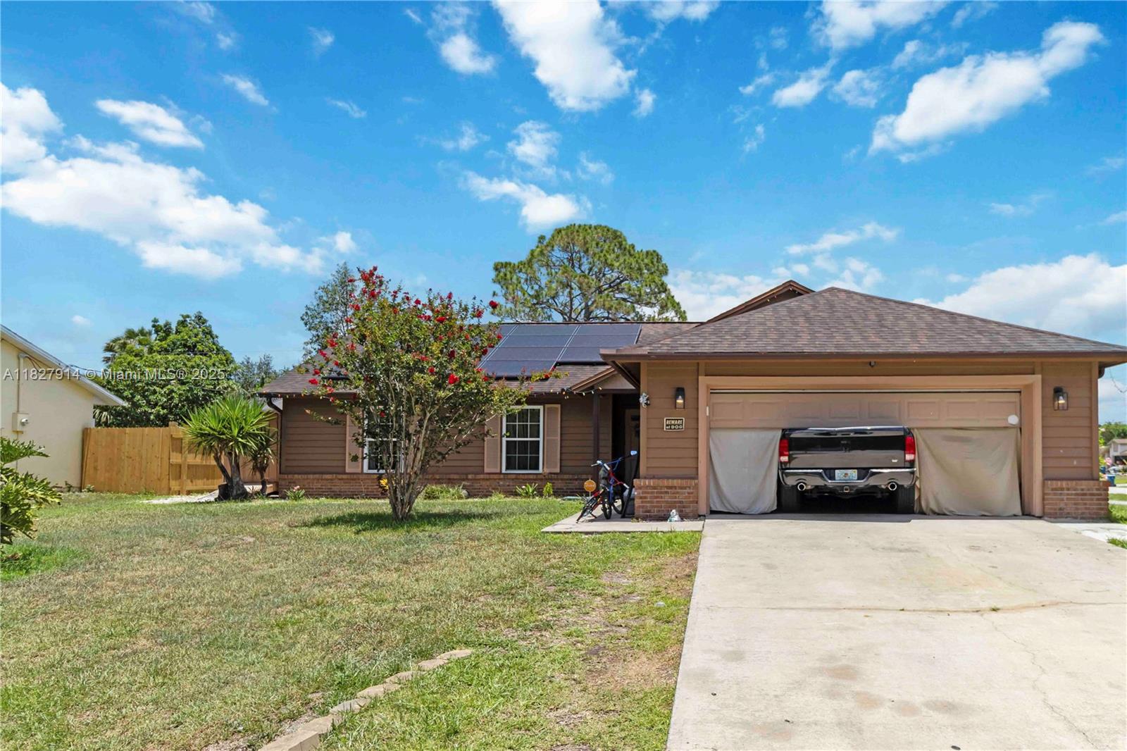 Palm Bay Pool Home! This charming 3-bedroom, 2-bath residence offers a spacious living and dining area, plus an eat-in kitchen featuring stainless steel appliances —perfect for the avid cook. Double-paned, tinted vinyl windows and slider, as well as the water heater, were replaced in 2015. The roof was replaced in 2018, and both bathrooms have been tastefully remodeled. Ceilings feature skip trowel texture, and the screened pool enclosure has been updated. Enjoy your private backyard oasis complete with a covered patio for entertaining, a sparkling pool for relaxing, and a vinyl fence for added privacy. Conveniently located with easy access to St. Johns Heritage Parkway.