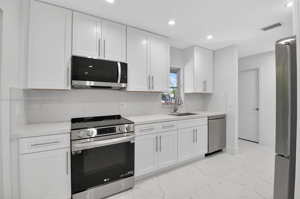 Photo of 8840 Rheims Rd, Boca Raton, FL 33496 (MLS # A11861259)