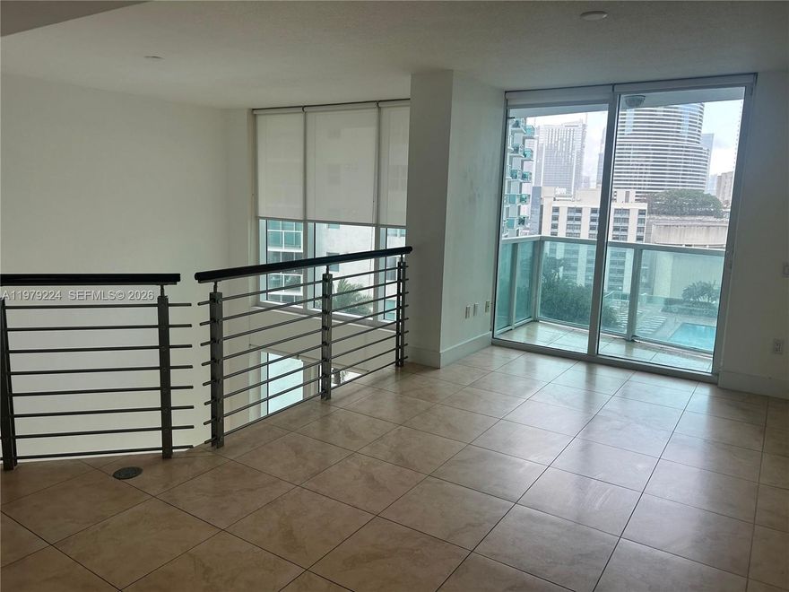 Amazing 2 story Loft style condo in Brickell on the River South with views of Biscayne Bay, Downtown and Miami river. Floor to ceiling glass windows, private balcony, sleek modern kitchen with granite counter tops & stainless steel appliances, marble bath s with vessel sinks. Walking distance to parks, shopping areas, fine restaurants, financial district, Brickell Village & night life. Amenities include: 24/7 security, pool with sundeck, fitness center/spa, conference room, concierge & valet service. 2 PARKING SPACES!