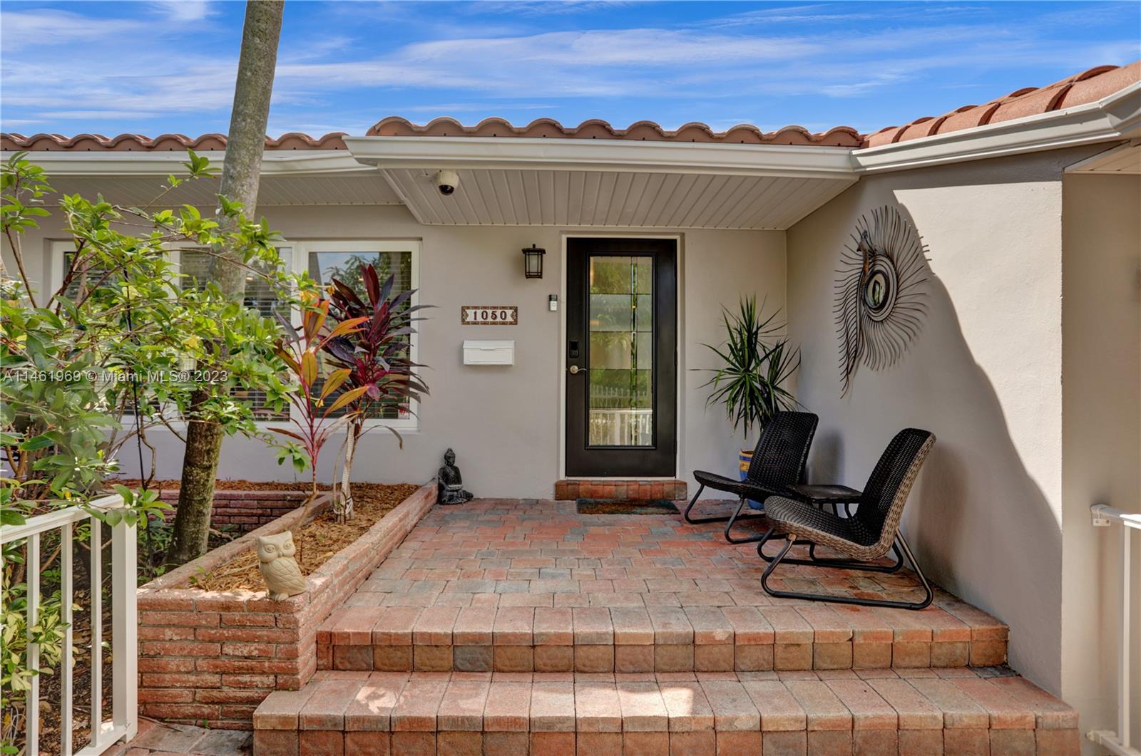 Hollywood Lakes Hidden Gem. A private paradise awaits behind front hedges with a 3/2 home, large pool, screened porch, huge patio, 1-car garage, 2-car carport, fenced yard, 10,000+ sq ft lot. Spacious interior has been upgraded with large white floor tiles, an amazing kitchen (custom wood cabinets, quartz counters, high-end stainless steel appliances, beautiful backsplash), designer light fixtures. Other upgrades include impact glass windows, whole-house generator, tankless gas hot water heater. Great location in Hollywood Lakes, mid-way between beach/Broadwalk and town/park, close to marina/boat ramp, Hollywood Golf Course, 2 small parks. Hollywood has easy access to transportation (highways, airports, ports, TriRail) shopping (Gulfstream, Aventura Mall, Dania Pointe), parks and schools.