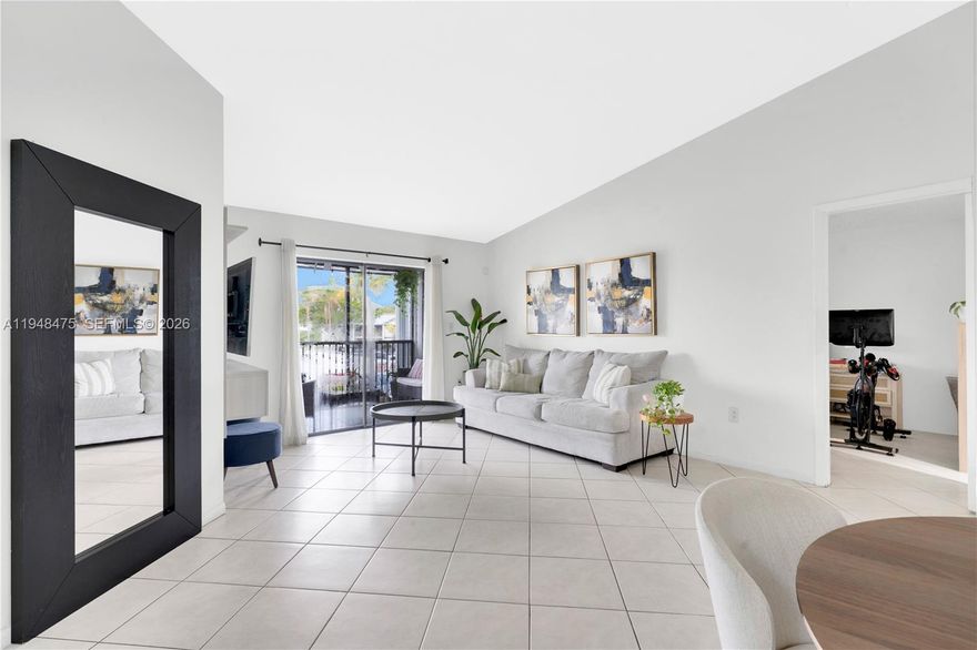 Step into this bright and spacious condo in the highly desirable gated community of Carmel Lakes. This move-in ready unit features beautiful tile flooring throughout, an open and comfortable layout, and a private screened balcony that expands your living space and offers the perfect spot to relax. The kitchen flows seamlessly into the main living area, allowing for easy entertaining and everyday comfort. Enjoy the convenience of an in-unit washer and dryer, and an assigned parking space right in front of the building, plus plenty of guest parking for visitors. The community is meticulously maintained and offers a sparkling pool, gated entry, and tranquil surroundings.

Located minutes from major highways, shopping centers, restaurants, entertainment, beaches, and excellent schools, this property offers both comfort and unmatched convenience. OK to lease immediately, ideal for investors or end-users alike. A great opportunity in a sought-after Miami location!