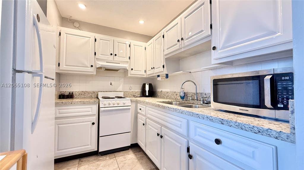 Photo of 22 SE 3rd Ter #31, Dania Beach, FL 33004 (MLS # A12065108)