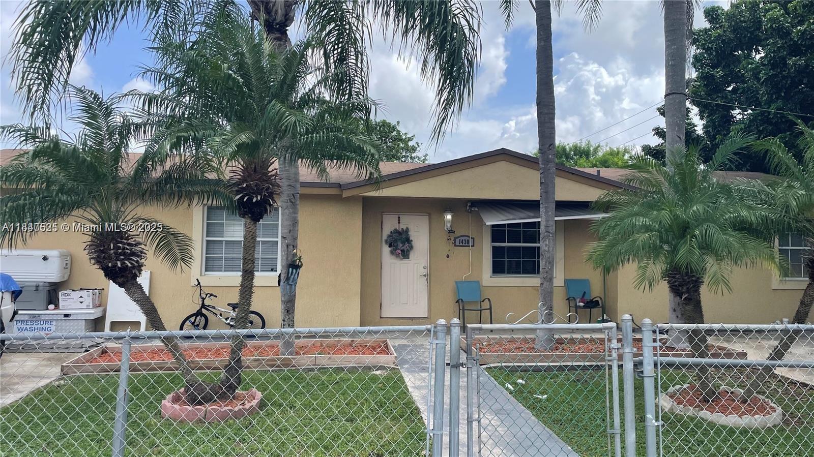 Spacious and comfortable 4-bedroom, 2-bath home with a extra den (office or addicional room) and laundry room, easily adaptable as a 5-bedroom layout. This corner lot property offers plenty of indoor and outdoor space, featuring spacious bedrooms, central A/C, tiled floors throughout, and a fully fenced large yard perfect for family living or entertaining. Enjoy the convenience of a double driveway, outdoor storage shed, and dedicated boat parking with private entrance. Located just minutes from the Turnpike and within walking distance to Waterstone Plaza (Publix, Walmart, Walgreens, and more), this home combines comfort, functionality, and a prime location