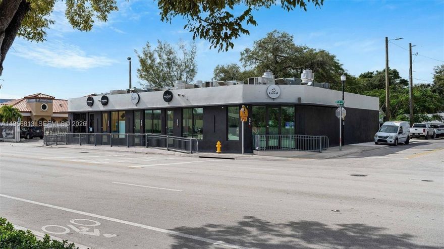 5960 NE 2nd Avenue is a fully renovated and stabilized commercial kitchen asset located along the rapidly strengthening NE 2nd Avenue corridor linking the Design District, Little River, and the MiMo District. Purpose-built for modern food production, the property
oers durable income, institutional tenancy, and exceptionally low operational involvement—ideal for investors seeking stable cash flow in Miami’s urban core.

The +-5,000 SF building was renovated between 2023 - 2025, and contains five autonomous ±1,000 SF kitchen suites, each engineered for efficiency, durability, and high-volume throughput. Every suite is equipped with a 16-foot hood, an 8'×10' walk-in cooler/freezer, a 54" reach-in cooler/freezer, independent electrical and gas service, and commercial-grade prep and utility infrastructure. The kitchens are designed to run independently, with systems sized for meal-prep companies, caterers, and delivery-oriented operators.

All leases are structured as NNN with mandatory maintenance contracts on critical systems—hood, HVAC, fire suppression, walk-ins, and grease infrastructure—resulting in minimal landlord responsibility. A 5% management fee embedded in the leases creates either supplemental income for an active owner or a built-in buer for owners utilizing third-party management.