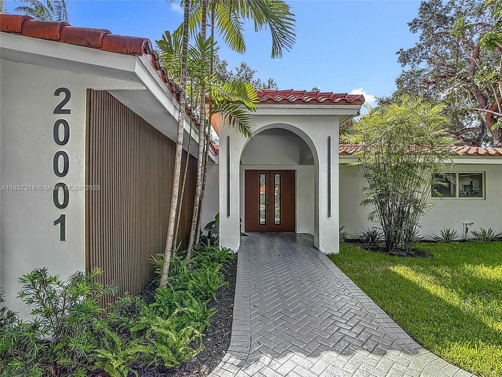 PRIME LOCATION IN OAK FOREST, GUARD GATED AND 24HR POLICE SECURITY! FULLY RENOVATED CUSTOM OAK FOREST HOME BOASTS OVER 3,400 SQUARE FEET ON A BEAUTIFUL 14,000 SF LOT, 4 BEDROOMS 4 BATHS. TILE ROOF REPLACED 2016, BRAND NEW AC AND DUCTS 2025, COMPLETELTY RENNOVATED CUSTOM KITCHEN WITH IMPACT/STAIN/TEMPERATURE RESISTANT COUNTERS, LARGE ISLAND AND EATING AREA, LUXURY APPLIANCES, ITALIAN BATHROOMS, LARGE FORMAT SPANISH AND ITALIAN TILE CERAMIC/PORCELAIN THROUGHOUT, BRAND NEW DIAMOND BRIGHT IN THE POOL AND RENOVATED POOL, BEACHSIDE AREA BY POOL, BASKETBALL COURT, GAZEBO WITH GRILL AREA, IMPACT WINDOWS AND DOORS, ASADOR ARGENTINE GRILLING STATION, MANGO TREES, LARGE FENCED BACKYARD. DONT MISS THIS OPPORTUNITY TO PURCHASE A HOUSE IN THE HIGH DEMAND OAK FOREST.