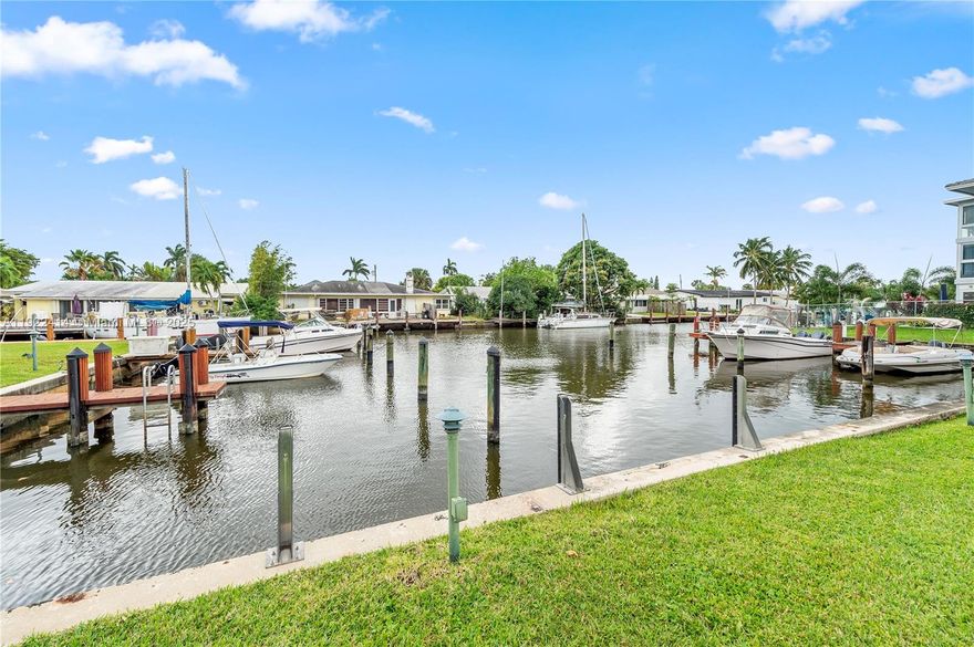 Enjoy peaceful water and pool views from your screened patio in this boutique community, featuring a NEW 2023 roof. Access to the community amenities and heated pool, paradise awaits. The unit itself boasts a modern kitchen with granite counters and stainless appliances, along with a newly upgraded primary bathroom and walk-in closet. Pet friendly with restrictions, private dock for up to 26' boat with straight access to the ocean! Building has reserves, seller's preferred lender financing options available for lowered rates! No rentals allowed. Furniture can be included in the sale.