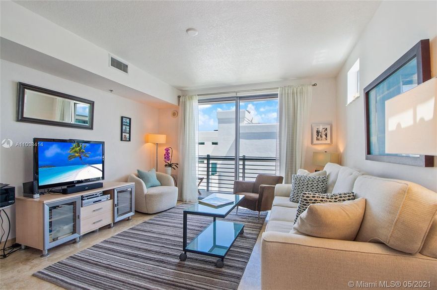 Located in the coveted South of fifth neighborhood, this top floor, sun filled unit features an open kitchen to the living room, granite counters, Italian fixtures, SS appliances, and a balcony overlooking the newly upgraded tropical landscaping. The Cosmopolitan is a full service bldg with 24/7 security, heated pool w/Jacuzzi, fitness center, & club-room. Walk 2 blocks to the beach, fine dining, & South Pointe Park. Building is financially secure.