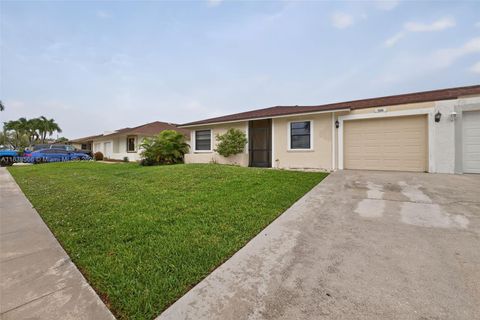 Photo of 1600 Granfern Ave, West Palm Beach, FL 33415 (MLS # A11838566)