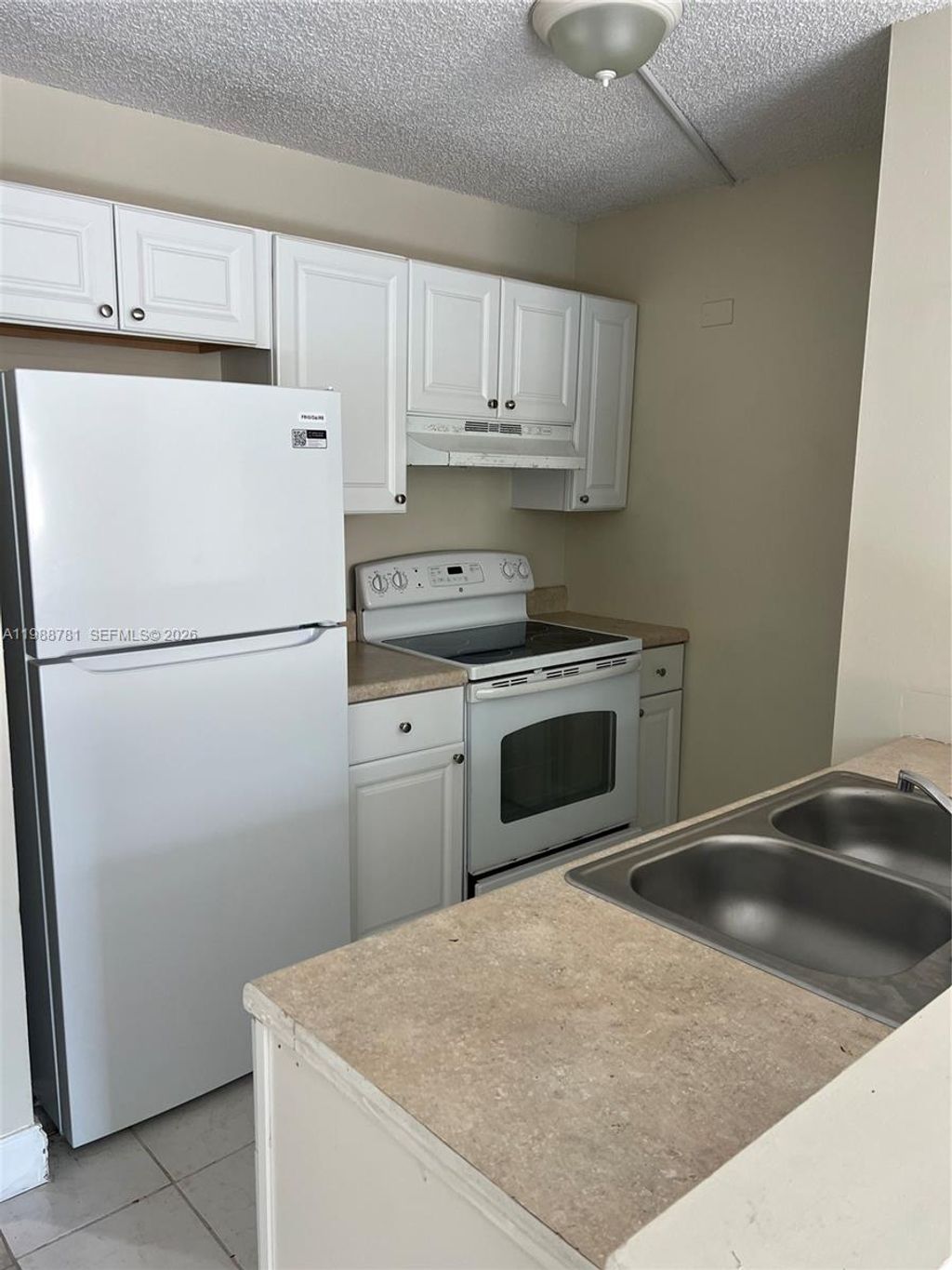 Photo of 2701 Riverside Dr #308-B, Coral Springs, FL 33065 (MLS # A11988781)