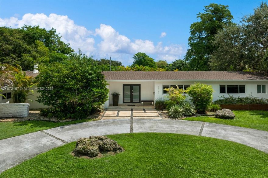 Situated on an expansive 32,103 sq ft lot, this beautifully updated single-story 4 bed, 3.5 bath residence offers an incredible real estate investment in one of the area’s most desirable neighborhoods. Thoughtfully renovated with modern finishes, the home features an open-concept layout and a versatile media room that can remain as-is or be converted into a fourth bedroom.The home features a newly updated roof, completed in 2024. Generous indoor-outdoor flow connects the interiors to a sunny pool and large backyard, perfect for entertaining or relaxing. A two-car garage adds convenience, while the oversized lot provides future flexibility to expand and enhance, ensuring long-term value in a premier location.