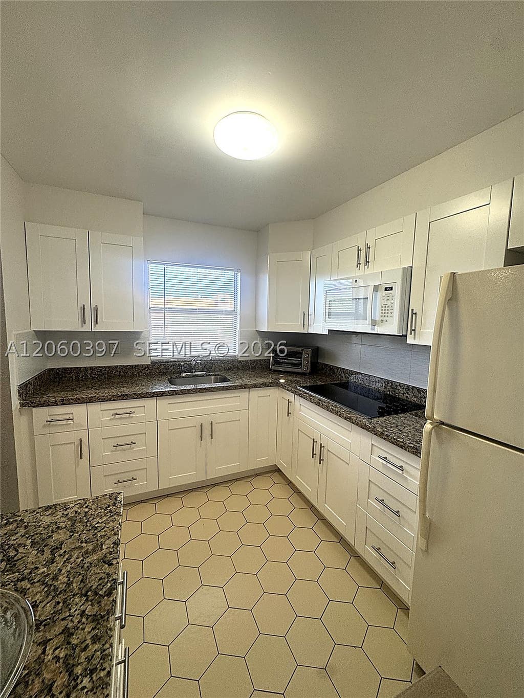 Photo of 9580 Sunrise Lakes Blvd #304, Sunrise, FL 33322 (MLS # A12060397)