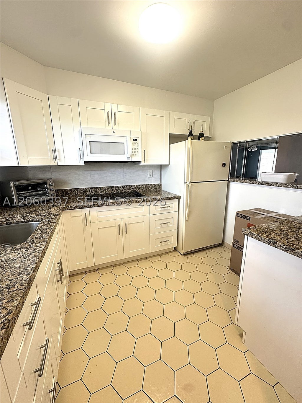 Photo of 9580 Sunrise Lakes Blvd #304, Sunrise, FL 33322 (MLS # A12060397)