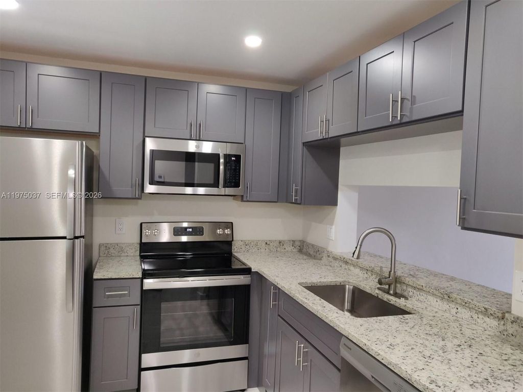 Photo of 8830 Royal Palm Blvd #202, Coral Springs, FL 33065 (MLS # A11975037)