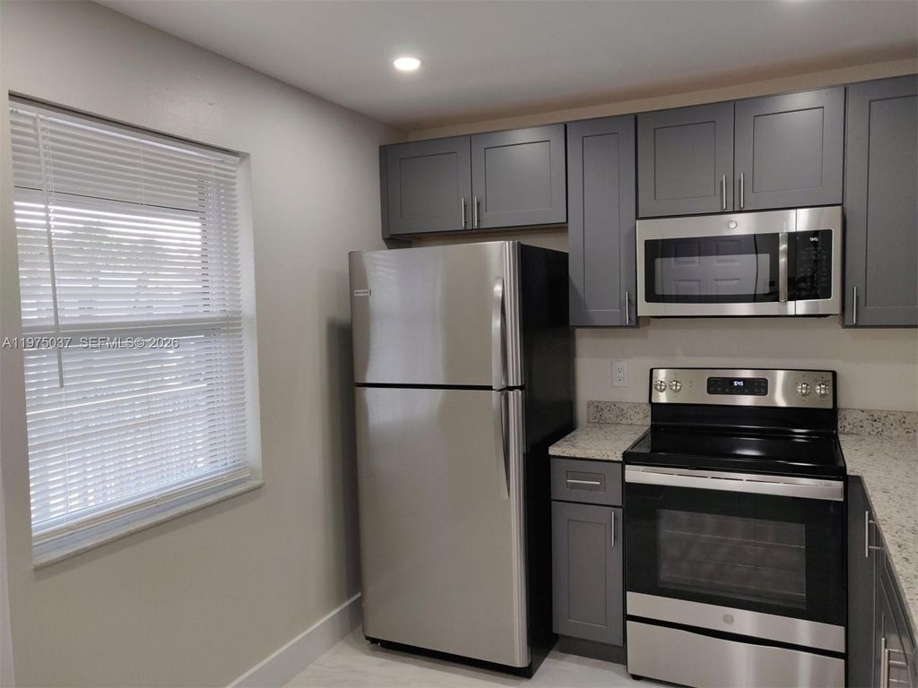 Photo of 8830 Royal Palm Blvd #202, Coral Springs, FL 33065 (MLS # A11975037)