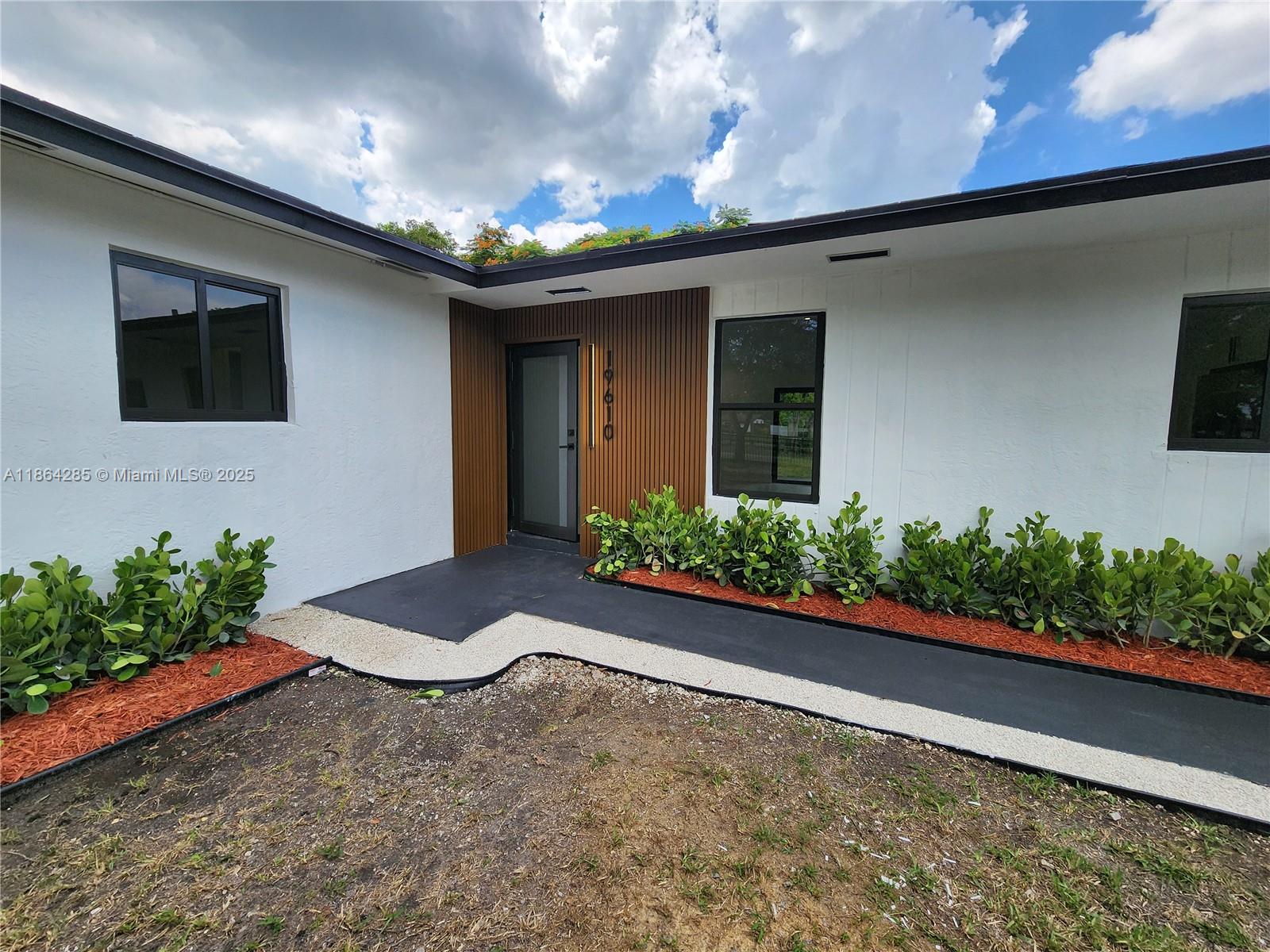Beautifully remodeled 5-bedroom, 3-bathroom Single-Family Home fantastically located across the street front Roberta Hunter Trial Park. This spacious home has been completely remodeled with a brand-new kitchen, modern bathrooms, and elegant finishes throughout. Also with a brand new Roof. Freshly new paint all through out. Brand new high impact windows and door. The Property has the possibility of converting 1/1 in-law suite or quarters. Plenty space on driveway to park a Boat. Step outside to the spacious backyard, perfect for outdoor gatherings, barbecues, or simply unwinding in your own private oasis. Whether you're looking for a forever home or an investment opportunity. No HOA. This move-in-ready gem has everything you need! Don't miss out your opportunity!!