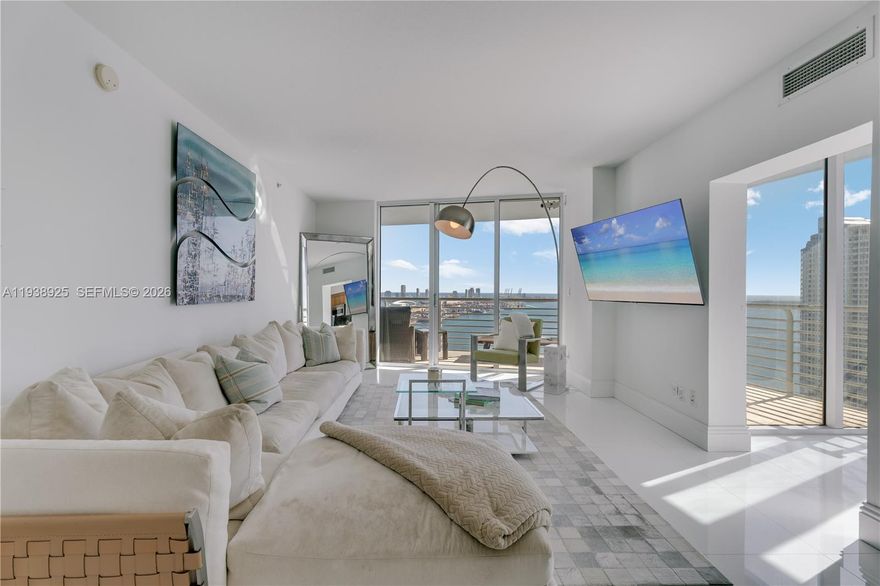 This 3-bedroom, 2-bath residence at One Miami Condominium is located in one of the building’s most sought-after 23-line layouts, offering expansive, unobstructed views of the water and city skyline. The spacious living and dining area is ideal for both daily living and entertaining, with floor-to-ceiling windows that provide abundant natural light and frame stunning views of Biscayne Bay, the Miami River, and the city. The bedroom layout ensures privacy and functionality, complemented by ample closet space and peaceful views. One Miami offers proximity to Brickell, Bayfront Park, dining, and shopping, making this residence an excellent opportunity for buyers seeking the perfect combination of views, layout, and location.